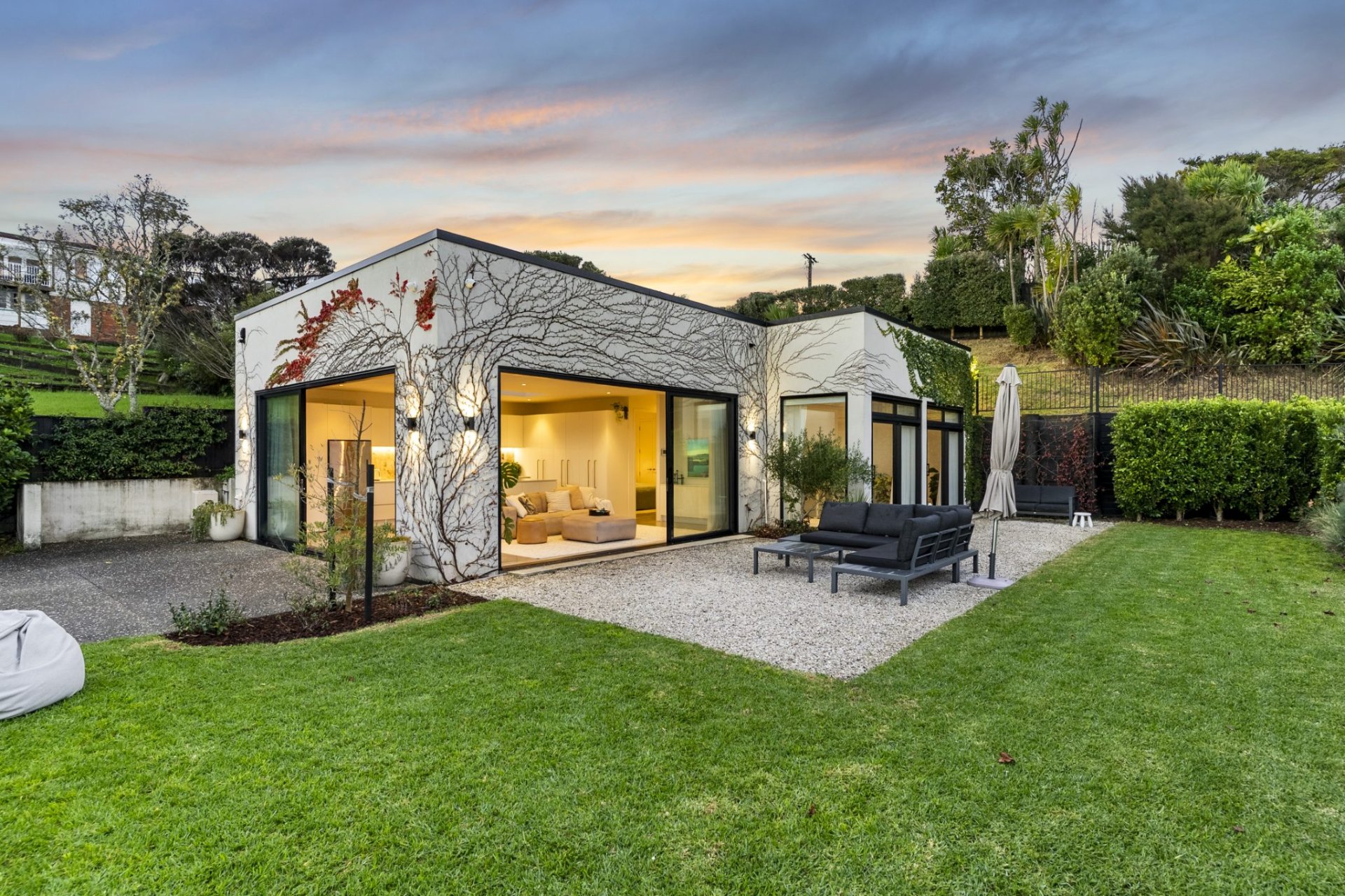 Auckland home prepared for sale with refreshed garden and trimmed hedges